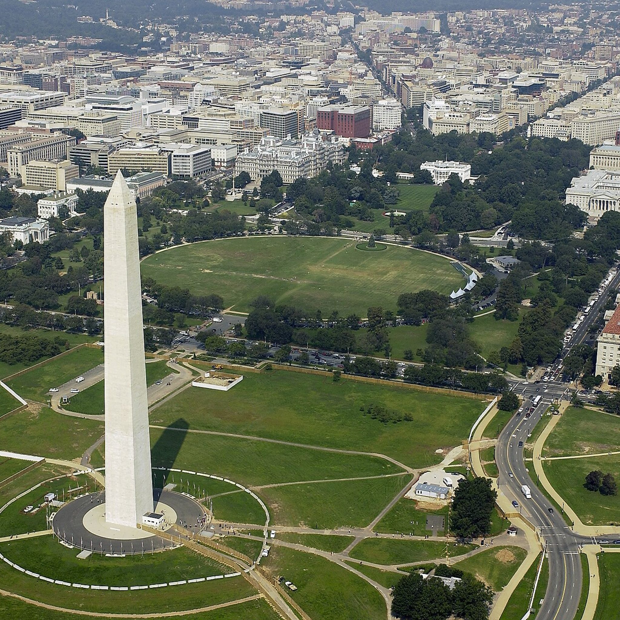 Aerial view of the Washington Monument with the White House behind it in Washington DC